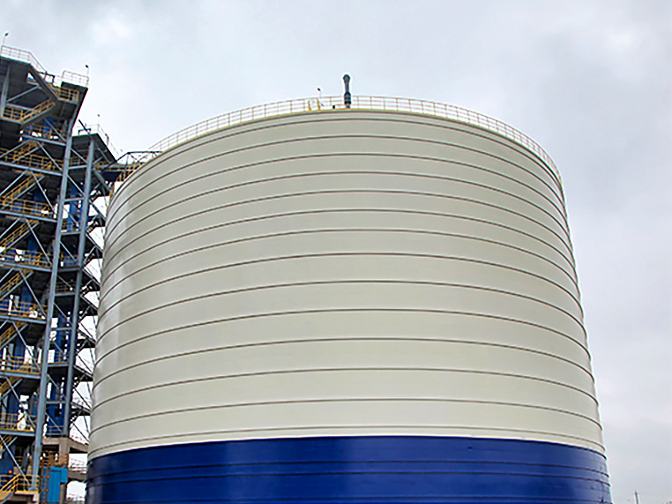 Welded steel silo with bucket elevator tower for clinker plant conveying
